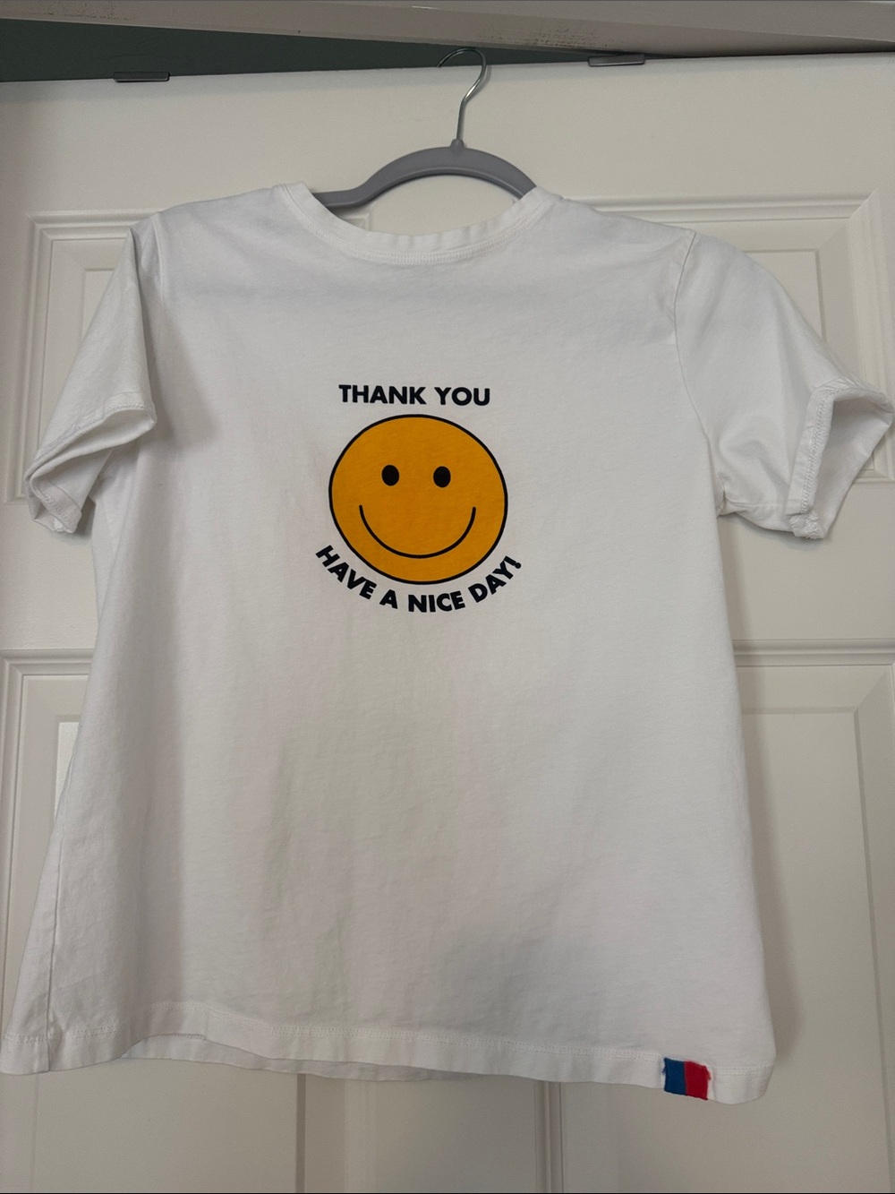 KULE White Short-Sleeve Tee with Yellow Smiley Graphic